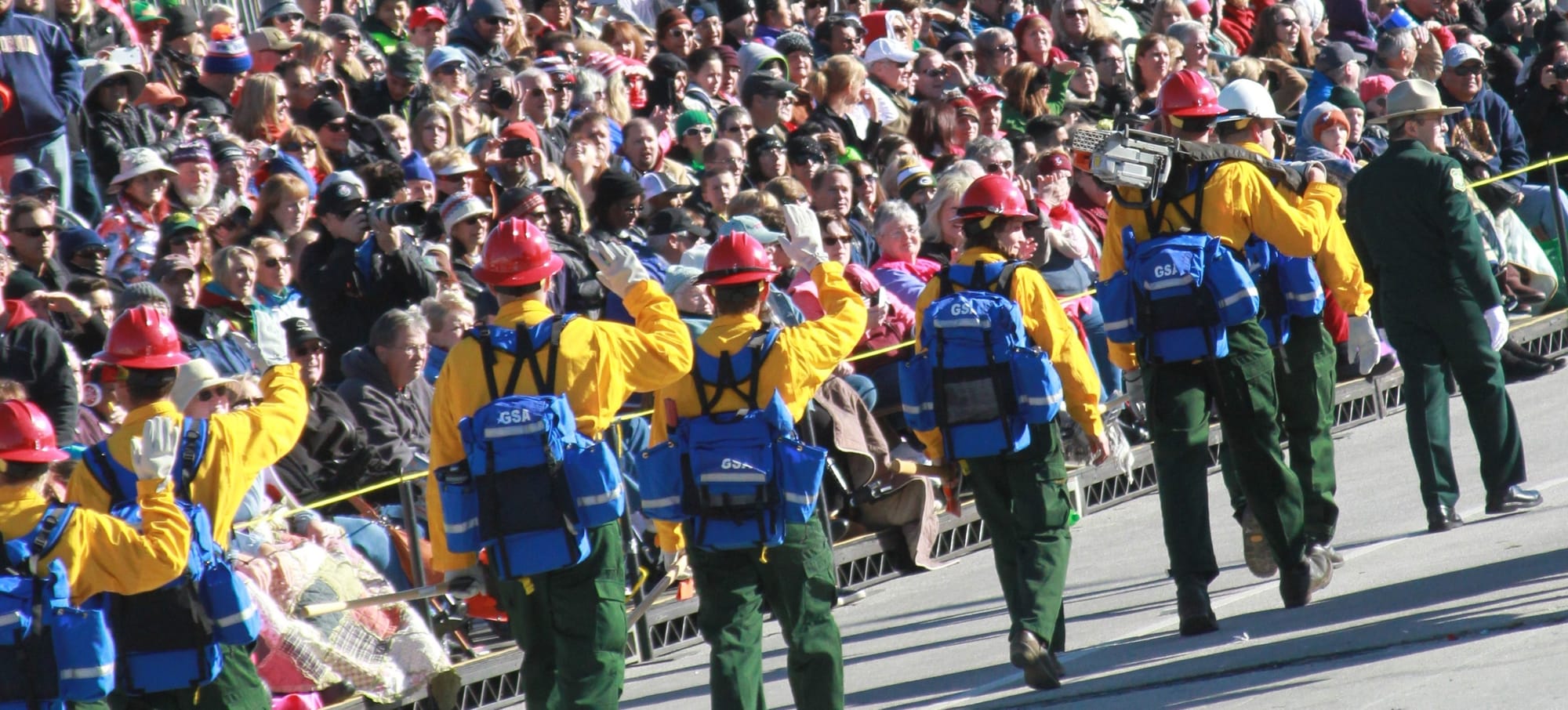 U.S. Forest Service Director of Fire and Aviation Management Tom Harbour (far right), a former Fire Chief of the Angeles National Forest, leads a crew of fully outfitted wildland firefighters down Colorado Boulevard in the Rose Parade in Pasadena, Calif. on January 1, 2015.