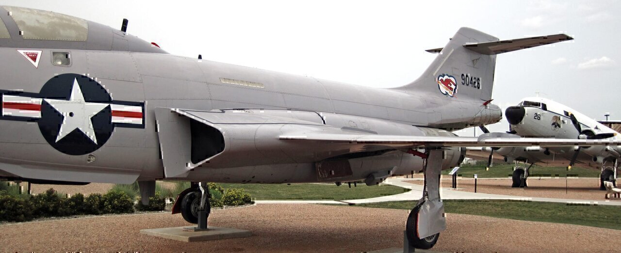 (South Dakota Air and Space Museum collection, Ellsworth Air Force Base, Rapid City, South Dakota, USA)
The F-101B Voodoo is a United States Air Force plane used in the 1950s to 1980s. It is a two-seat, twin-jet engine, interceptor-fighter plane.
From exhibit signage:
F-101B Voodoo
Top Speed - 1,100 miles per hour
Crew - 2
Range - Continental
Payload - 4 air-to-air missiles, or 2 missiles and 2 Genie nuclear rockets
Partners in the Cold War: the Royal Canadian Air Force
Jets like this one served as interceptors: they defended the nation's borders against aerial attack. But although they were designed for our Air Force, American aerospace companies also supplied our allies. F-101s (designated CF-101s) were the primary air defense for the Royal Canadian Air Force for over 20 years. In the Voodoo, Canadian pilots intercepted Soviet planes testing North American defenses.
See info. at:
<a href="https://en.wikipedia.org/wiki/McDonnell_F-101_Voodoo" rel="nofollow">en.wikipedia.org/wiki/McDonnell_F-101_Voodoo</a>
